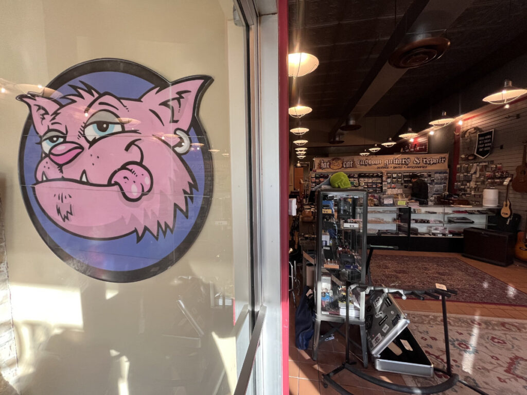 repair shop at fat cat custom guitars shop entrance